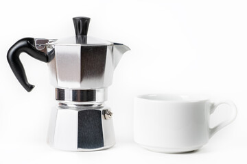 Traditional Italian coffee maker Moka pot and cup on white background.