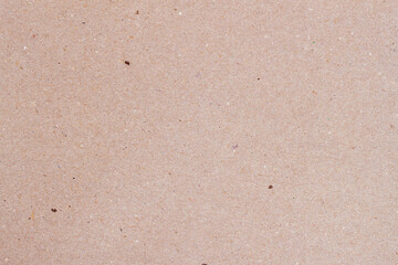 Cardboard, organic paper texture cardboard background, surface with small inclusions of cellulose