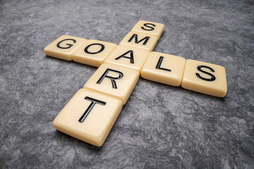 SMART goals - crossword in ivory letters against textured paper, goal setting, business and personal development concept