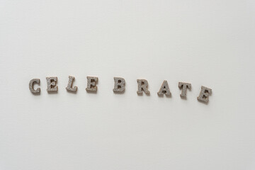 the word "celebrate" isolated on paper