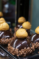 Dessert with chocolate and pastry on pâtisserie showcase. 