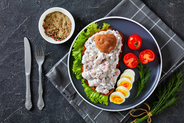 danish smorrebrod with shrimps, mayo, roe, and egg