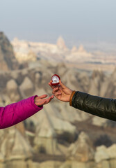 : wedding, marriage proposal in Cappadocia, Man gives wedding ring to his lover, fiance, girlfriend...