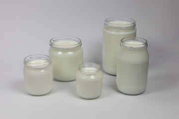 milk in jar on white background