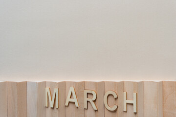 background with the word "march" on a fancy wooden object with space for your text