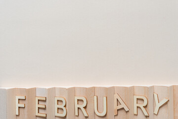 background with the month of february on a fancy wooden object