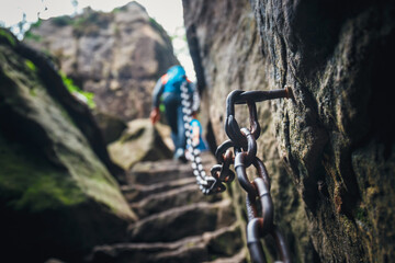 Chain to facilitate the difficult passage hiking trail in the mountains