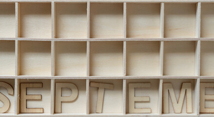 month september (cutoff) arranged in a wooden box