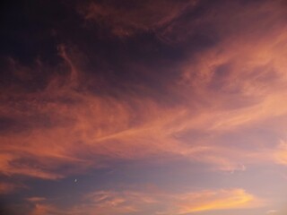 Fototapeta na wymiar rRd sky with clouds background