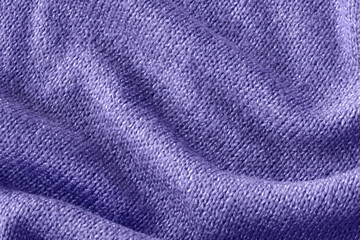 Fototapeta na wymiar Color of the year 2022 soft knitted sweater texture closeup. Light violet blue abstract background. Trendy soft blue backdrop for web design. Luxury twisted fabric backplate 