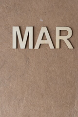 abbreviation of the month march in wood letters