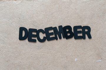 the month "december" in black chalk letters