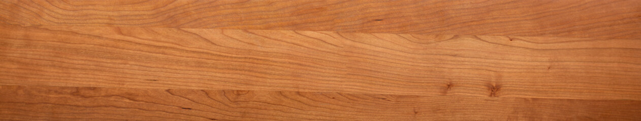 Long and wide wooden texture panoramic background. Solid wood splicing long tabletop, cherry wood...