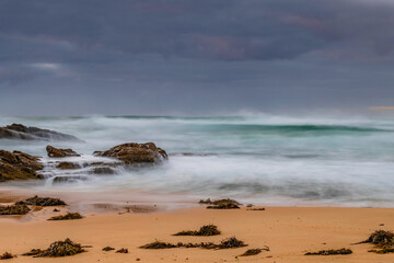 Rocks and waves - sunrise seascape at Bermagui