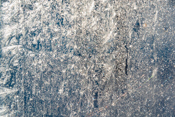 Frozen glass. Ice on glass. Blurred.