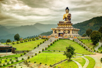 Beautiful huge statue of Lord Buddha, at Rabangla , Sikkim , India. Surrounded by Himalayan...