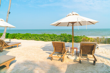 umbrella with beach chair and ocean sea background