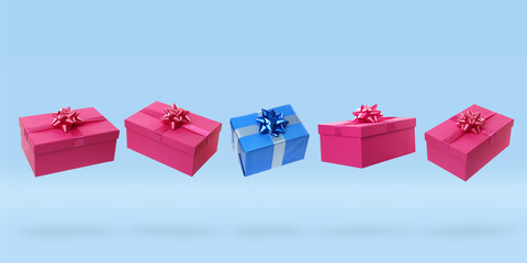 Beautifully wrapped gift boxes on light blue background