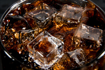 Ice cubs in a glass of soda