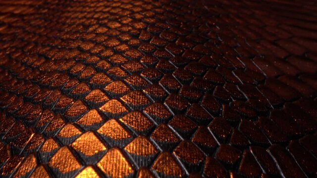 Leather texture very close up. Copper snakeskin pattern. Fashion and clothing industry, shoes, bag, belt, coat and other leather accessories. Leather Upholstery Furniture