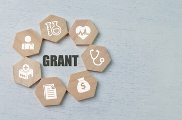 Wording GRANT with health and business symbols