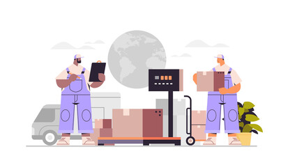 mix race deliverymen in uniform checks parcels in warehouse express delivery cargo logistics postal service