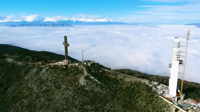 Vodno mountain in North Macedonia, above the clouds, aerial view