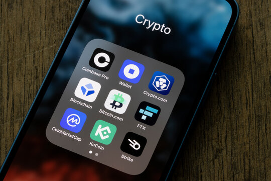 Portland, OR, USA - Nov 30, 2021: Assorted crypto apps are seen on an iPhone, including Coinbase Pro, Coinbase Wallet, Crypto.com, Blockchain, Bitcoin.com, FTX, CoinMarketCap, KuCoin, and Strike.
