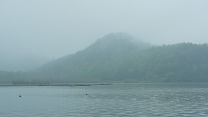 The beautiful lake landscapes with the traditional Chinese architecture along the shore