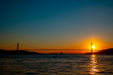 Fototapeta na wymiar Bosphorus Bridge. Silhouette of Bosphorus Bridge at sunset in Istanbul.