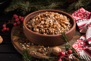 Kutya. Traditional Christmas slavic dish kutia porridge made of wheat grains, poppy seed, nuts,...