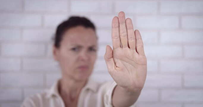 Woman discrimination at home. A woman want to stop a domestic aggression in her life.