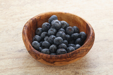 Sweet ripe blueberry heap in the bowl