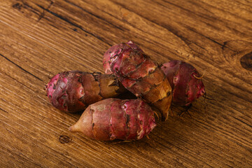 Raw topinambur root or Jerusalem artichoke