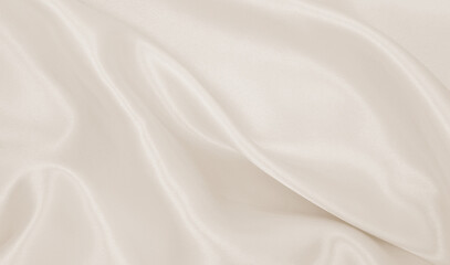 Fototapeta na wymiar Smooth elegant golden silk or satin luxury cloth texture as wedding background. Luxurious background design. In Sepia toned. Retro style