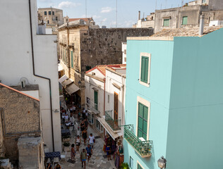 Otranto, Puglia, Italy. August 2021. View from above of the historic village: tourists and...