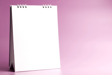 Blank notebook, spiral notebook 
on pink background.  with copy space 
