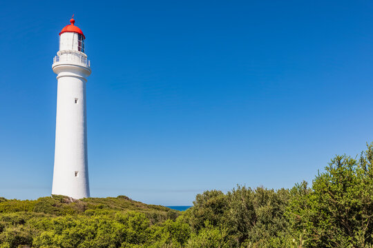Split Point Lighthouse standing against clear blue sky