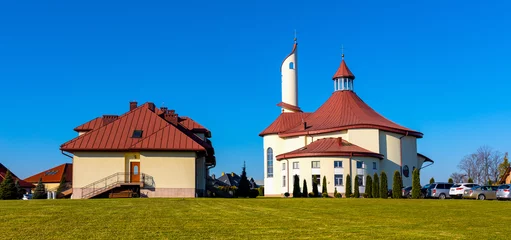 Poster Modernistic Sanctuary of the Divine Mercy church and clergy house in Sedziszow of Podkarpacie region in Lesser Poland © Art Media Factory