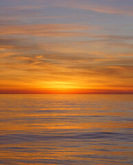 Naklejka na ściany i meble sunset over the sea in versilia