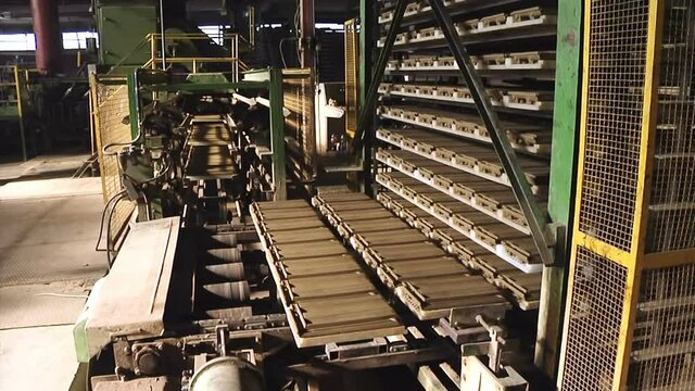 Clay Roof Tiles Production ; Production line of a modern factory for making ceramic tiles