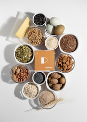 A set of natural products rich in phosphorus . Organic phosphorus sources. Cardboard sign with the inscription..