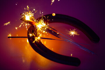 Horseshoe with star thrower, symbolic of New Years Eve, New Year, New Year - obrazy, fototapety, plakaty