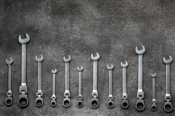 Flexible ratchet wrenches on gray background