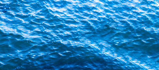Fototapeta premium The bright blue sea floor or perhaps canals and pools can be used as background images for aquatic and fishery-related or perhaps flood-related tasks.