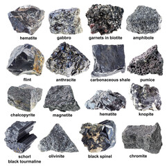 various unpolished black stones with names cutout