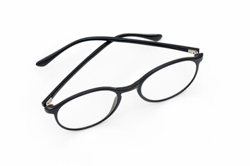 Stylish modern fashionable eyeglasses on the gray background.