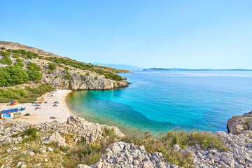 Crystal clear water at beach "Zala Stara Bask" on the island Krk in Croatia