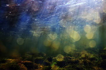 sun rays under water landscape, seascape fresh water river diving