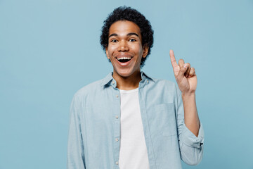Insighted smart proactive charismatic young black curly man 20s years old wears white shirt holding...